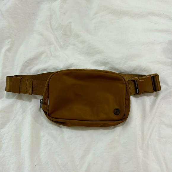 lululemon athletica Handbags - Lululemon 1L belt bag in the color brown